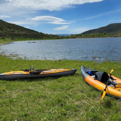Inflatable kayaks by a lake