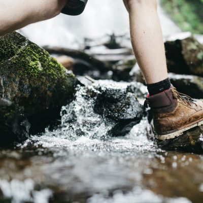hiking boots through a stream