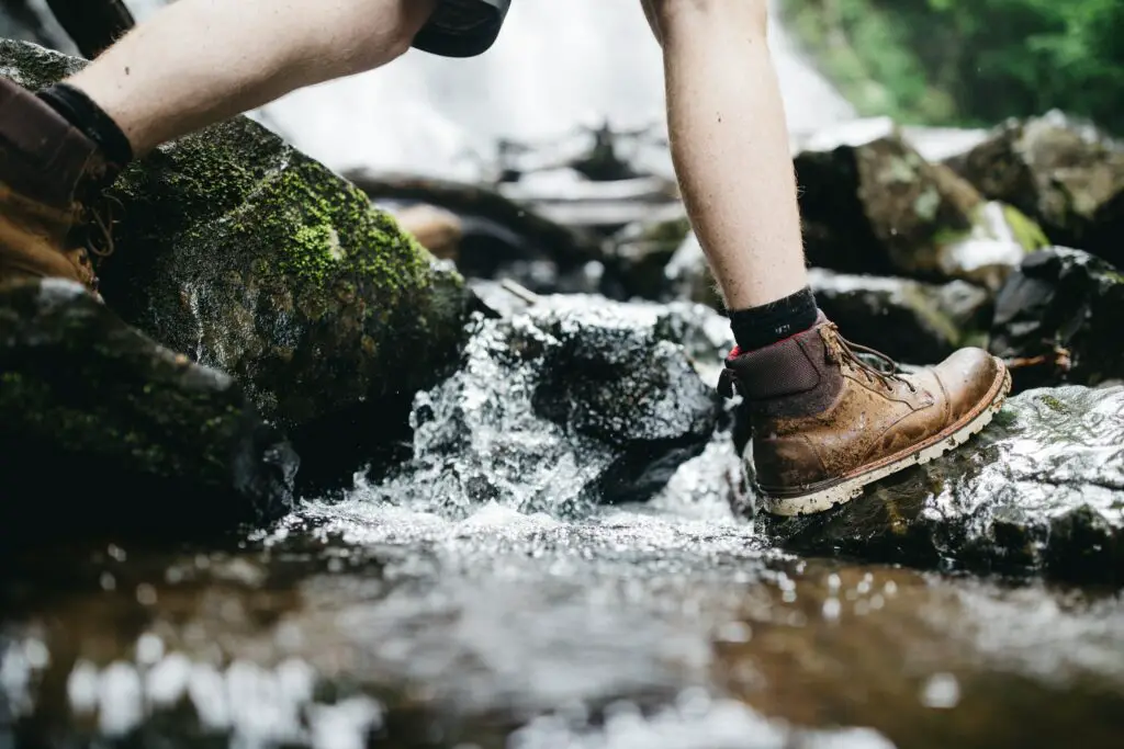 hiking boots through a stream