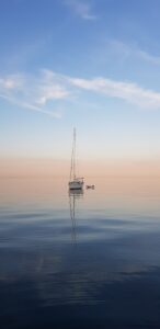 sailboat in calm seas