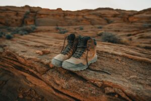 hiking boots on a ledge