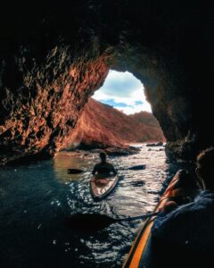 kayaking through a cave